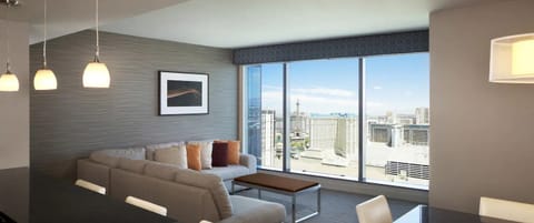 Relax in a bright lounge with wide city panoramas.