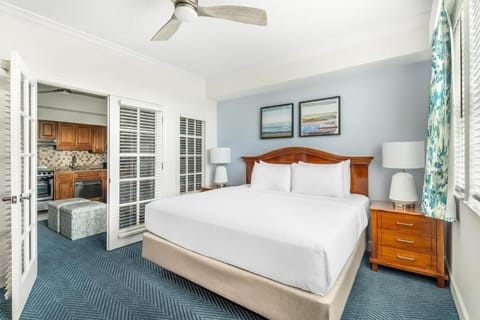 Unwind in a bright king bedroom with adjoining suite space.