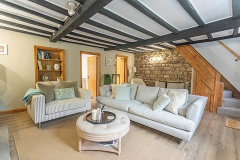Settle into the characterful lounge, where original beams, soft seating and warm stone walls create an inviting place to unwind after a day exploring North Yorkshire.