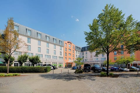 Arrive with ease to a bright, modern hotel exterior.