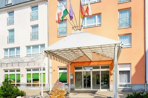Arrive with ease beneath the covered entrance and welcoming facade