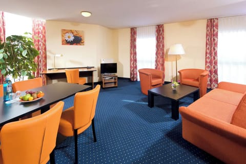 Living Room. Interior and views may vary based on location and availability.