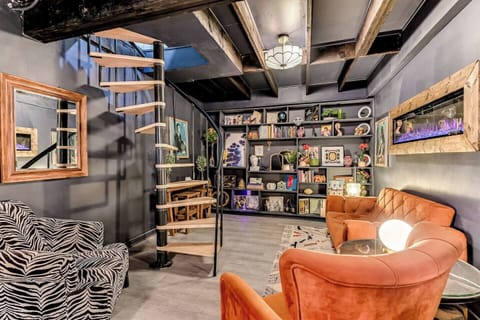 The Speakeasy Bar has a library with a fireplace 