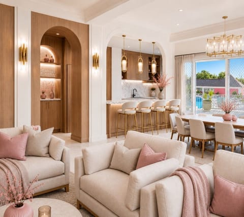 Bright, open concept, stylish blush pink featuring a patio walkout to pool!