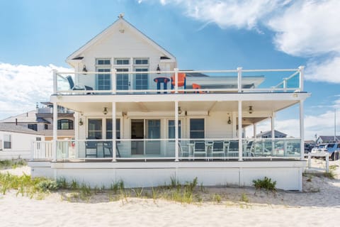 Enjoy views of Hampton Beach directly from the wrap around porch