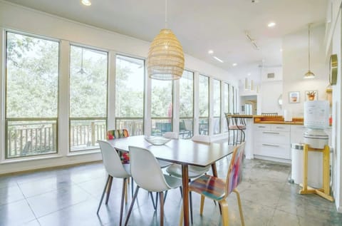 kitchen and dining with gorgeous treetop and lake views
