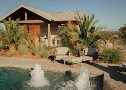 Welcome to Kiler & Vine - Take a refreshing swim while soaking in vineyard views. Sparkling fountains and comfortable lounge seating make this pool a perfect sunny day escape.