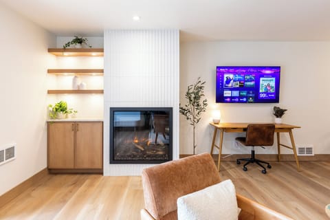 Our large "Real Flame" electric fireplace and 55' Smart Roku TV create the perfect setting to relax after an exciting day on the mountain.
