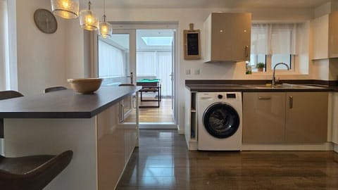 No need to eat out every night! Our kitchen is ready for you, complete with a washer/dryer to make longer stays a breeze.