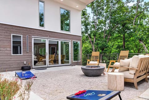 Gather around the gas fire pit on the private patio, framed by the Ozark woods.