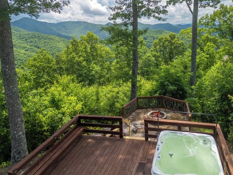 Hot Tub - Private hot tub with a mountain backdrop.