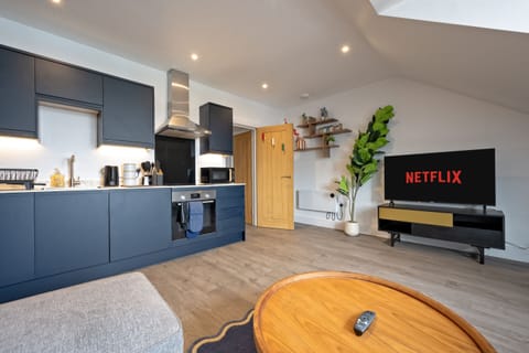 Open Plan living Area with 50 inch QLED TV 