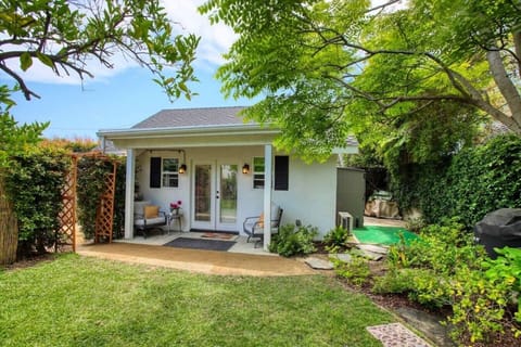 Your private garden getaway begins here, tucked behind a locked gate and fenced walkway.