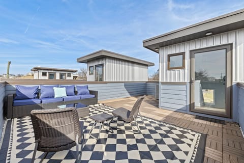 Enjoy outdoor seating on the deck, perfect for lounging and soaking up the sun.