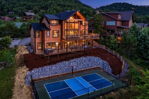 Night view with private pickleball court