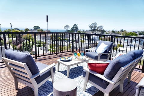 The rooftop deck offers views of the ocean