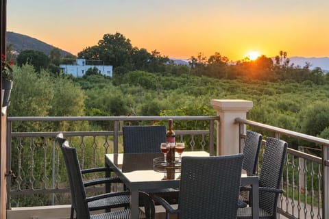 Watch the sun set over the Cretan countryside from the spacious furnished balcony.
