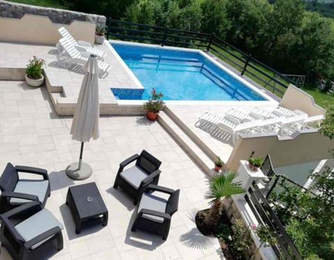 Relaxation and sunbathing corner by the pool