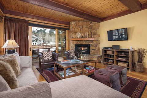 Sink into the living room seating with mountain views through the windows.