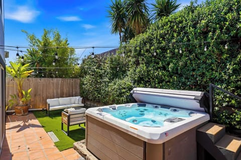 Soak and unwind in your private hot tub 💦🌿