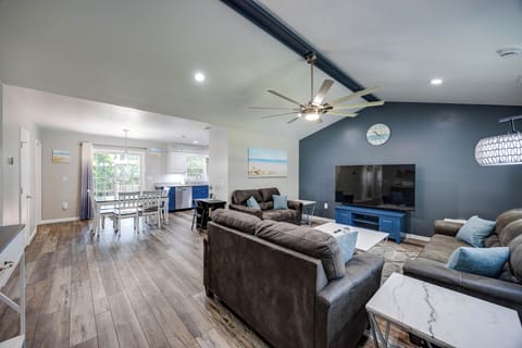Living room with comfortable seating and large TV