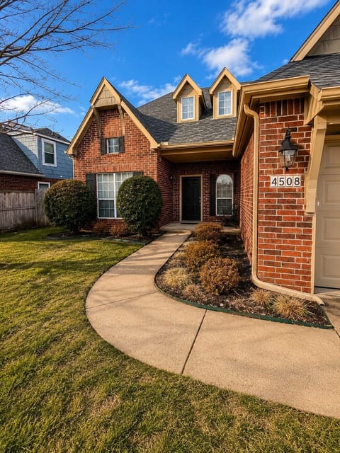 Charming front entry with welcoming curb appeal and elegant details.