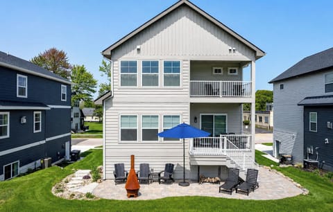 Welcome to Haven House, a stunning home steps from the lakeshore with a back patio and yard