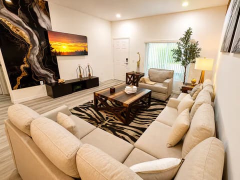Bright, open lounge with generous seating and stylish artwork.