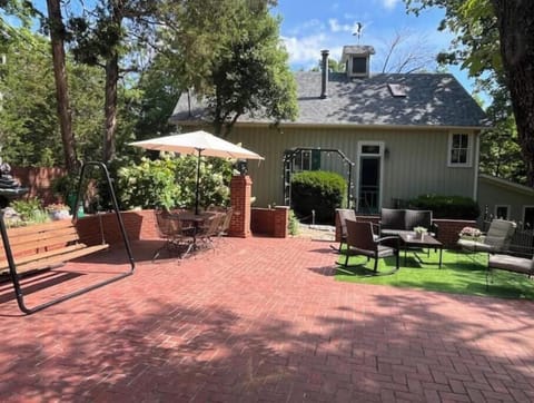 This is the brick patio for you to enjoy, comfortable furniture and umbrellas!