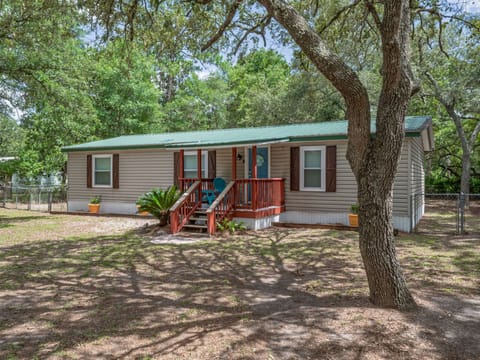 Open side yard offers room for lawn games or a quiet evening outside.