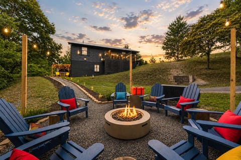 Gather 'round the fire pit as the sky turns gold — s'mores, stories, and starlight await.
