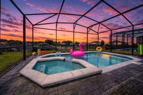 Relax and unwind in your private screened-in pool and spa, with comfortable outdoor seating and beautiful sunset views. Perfect for swimming, soaking, and making memories with family and friends.