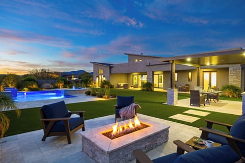 Fire pit and turf lawn.