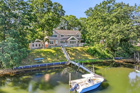 Waterfront living on Menantic Creek with a private 60-foot dock.