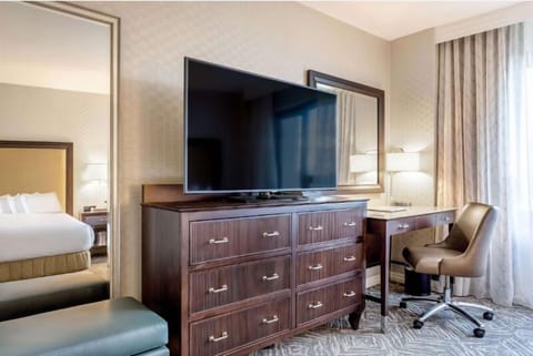 Settle in with a large TV and dedicated work desk.