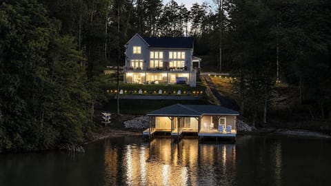 Lakefront Retreat: Enjoy stunning sunset views and relaxing on the spacious deck by the water!