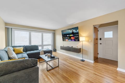 DSC07681Spacious living room with Smart TV, offering a comfortable space to relax after exploring Bayonne and nearby NYC.