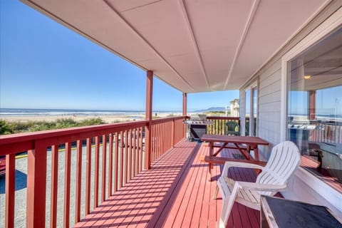 Covered outdoor balcony with ocean view