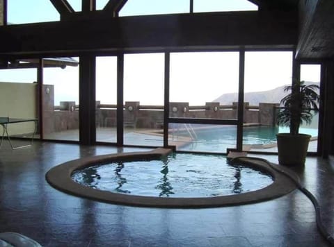 Jacuzzi y piscina temperada