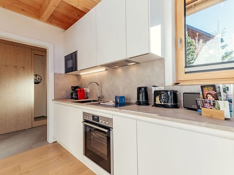 Kitchen, Wood, Interior Design, Kitchen Appliance, Countertop, Major Appliance, Flooring, Ceiling, Home Appliance, Cabinetry