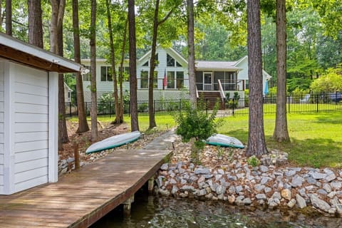 Large backyard with room for cornhole and lawn games.