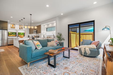 Living Room with access to private patio.