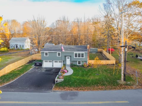 Spacious driveway  that fits 4-6 cars plus 2 car garage. 