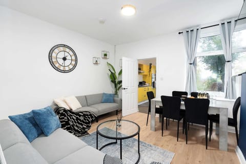 Smaller but cosy living and dining area  — perfect for groups to share meals or relax together after site work.