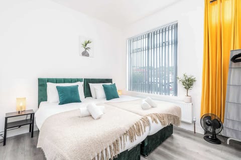 Spacious and Bright Twin Bedroom