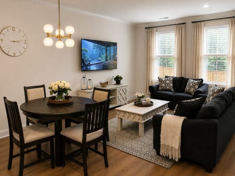 Dining table overlooking the living room and private backyard.