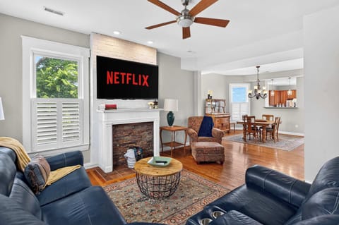 Living Room: This cozy living room offers plush seating, natural light, and a comfortable atmosphere, perfect for movie nights, quiet mornings, or relaxing together.