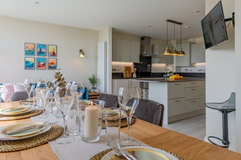 The dining table looks out onto views of Bristol Harbourside