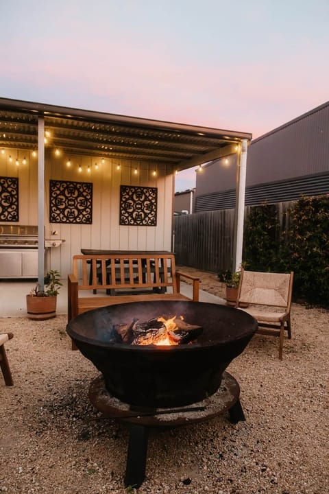 Fire pit area is the perfect spot to relax after a day at the beach. 