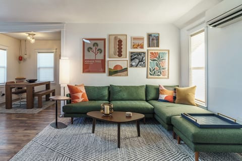 Stretch out on the spacious sectional after exploring Joshua Tree National Park, with the dining area just steps away.